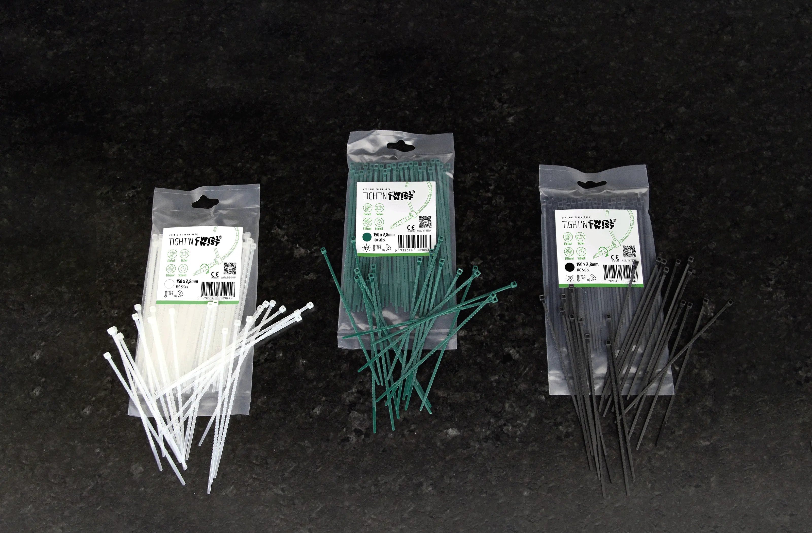Drei Bags mit Tight'n Twist Kabelbinder in den Größen 150x2p8 mm und den Farben Schwarz, Transparenz und Moosgrün
